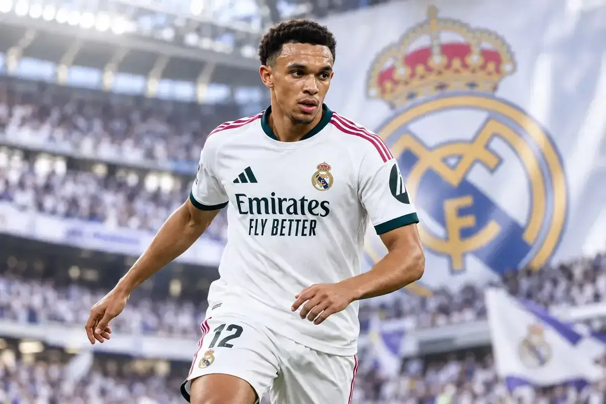 Trent Alexander-Arnold w białej koszulce Realu Madryt, z numerem 12 na spodenkach, na tle stadionu i herbu klubu.